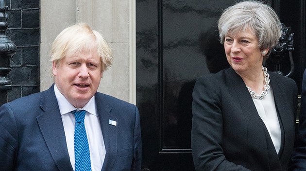Theresa May e seu ministro