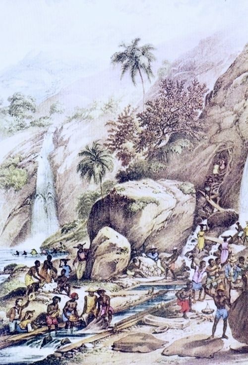Aquarela de Rugendas sobre a Lavagem do Ouro no Brasil Colônia. Nela, é possível identificar um grupo de escravizados extraíndo e beneficiando o ouro de um rio nas Minas Gerais.