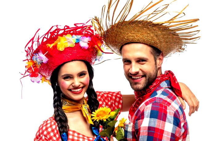 Casal vestido com roupa de festa junina