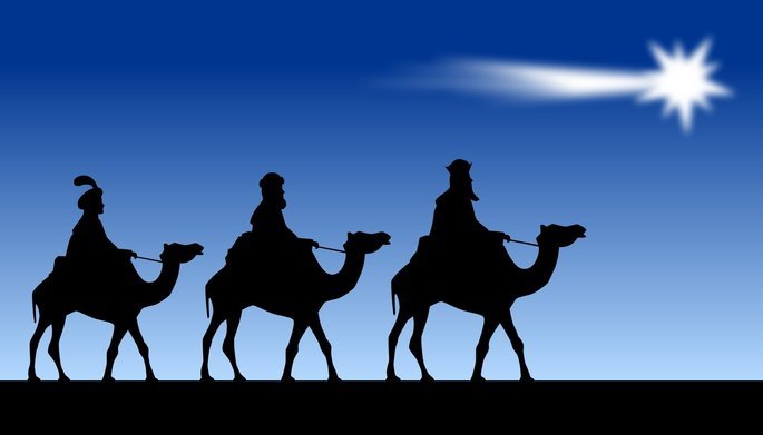 Silhueta dos três Reis Magos, montados em camelos, sendo guiados pela Estrela de Belém